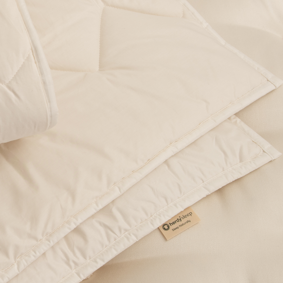 close up of a herdysleep british wool mattress protector